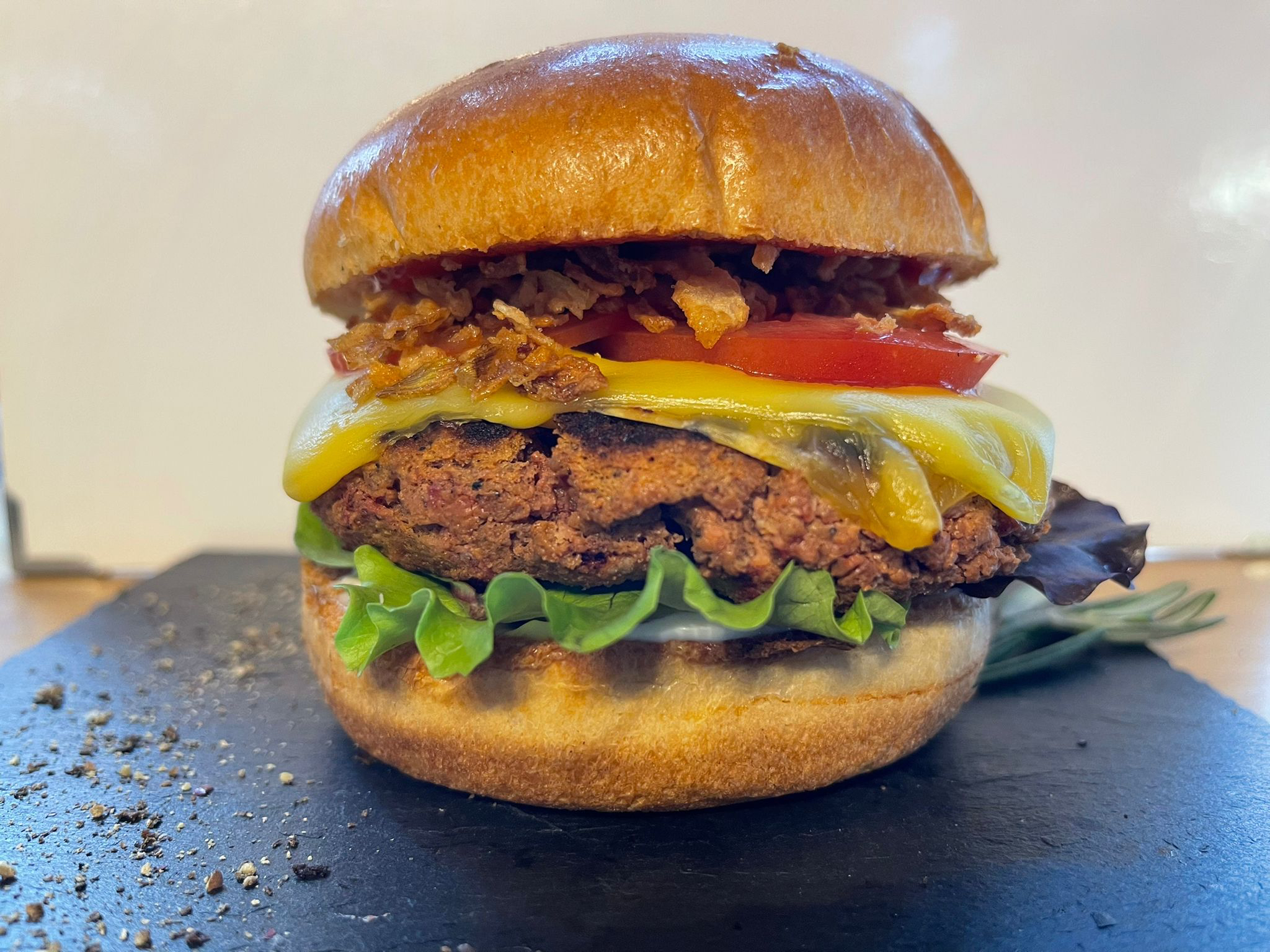 Close-up photo of a burger with meat substitute patty made from hemp.