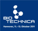 zu sehen ist ein blaues Logo mit weißer Schrift und einem weißen Symbol; das Logo der Biotechnica 2011